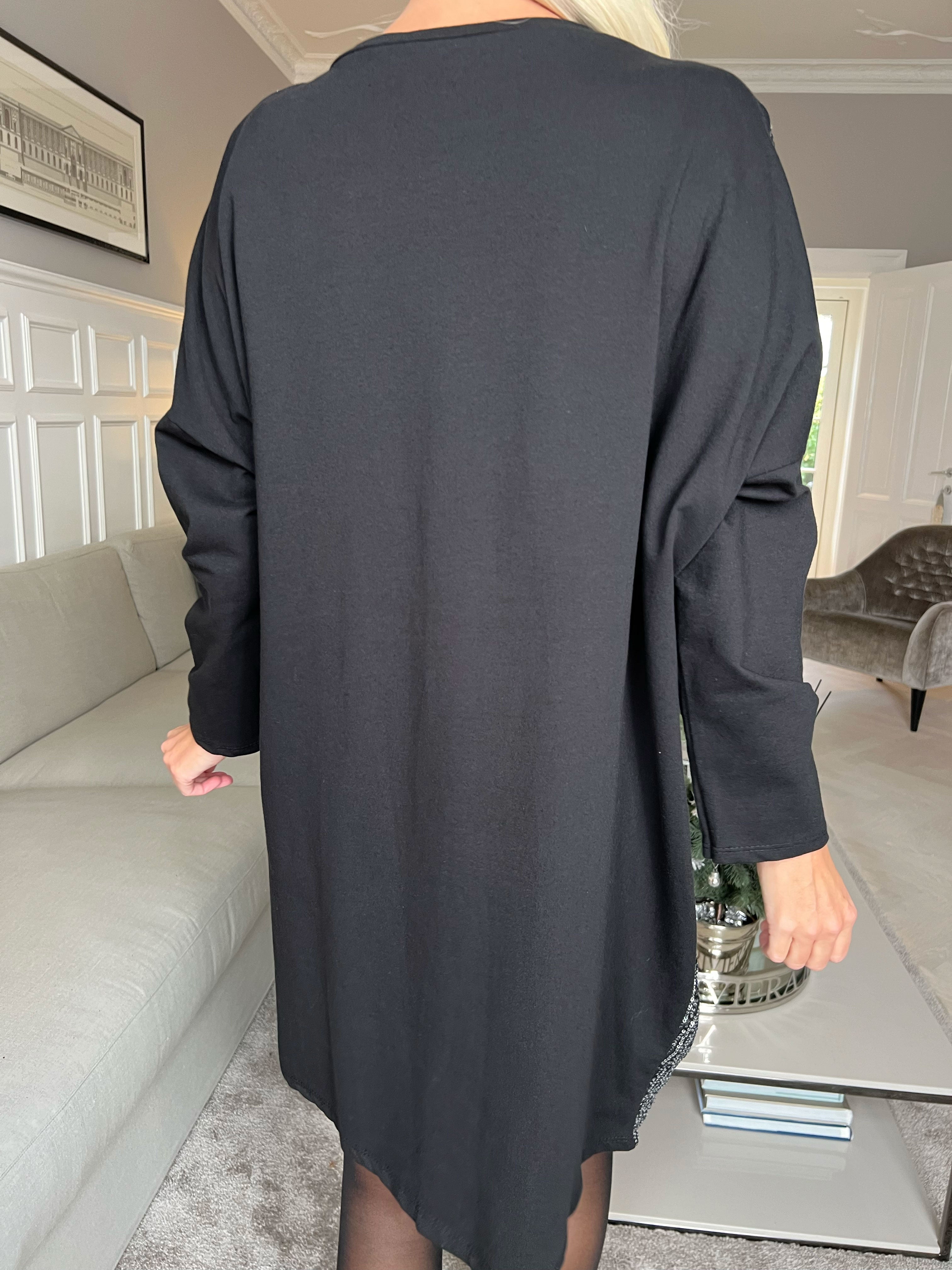 Eria - Kjole med pailletter foran